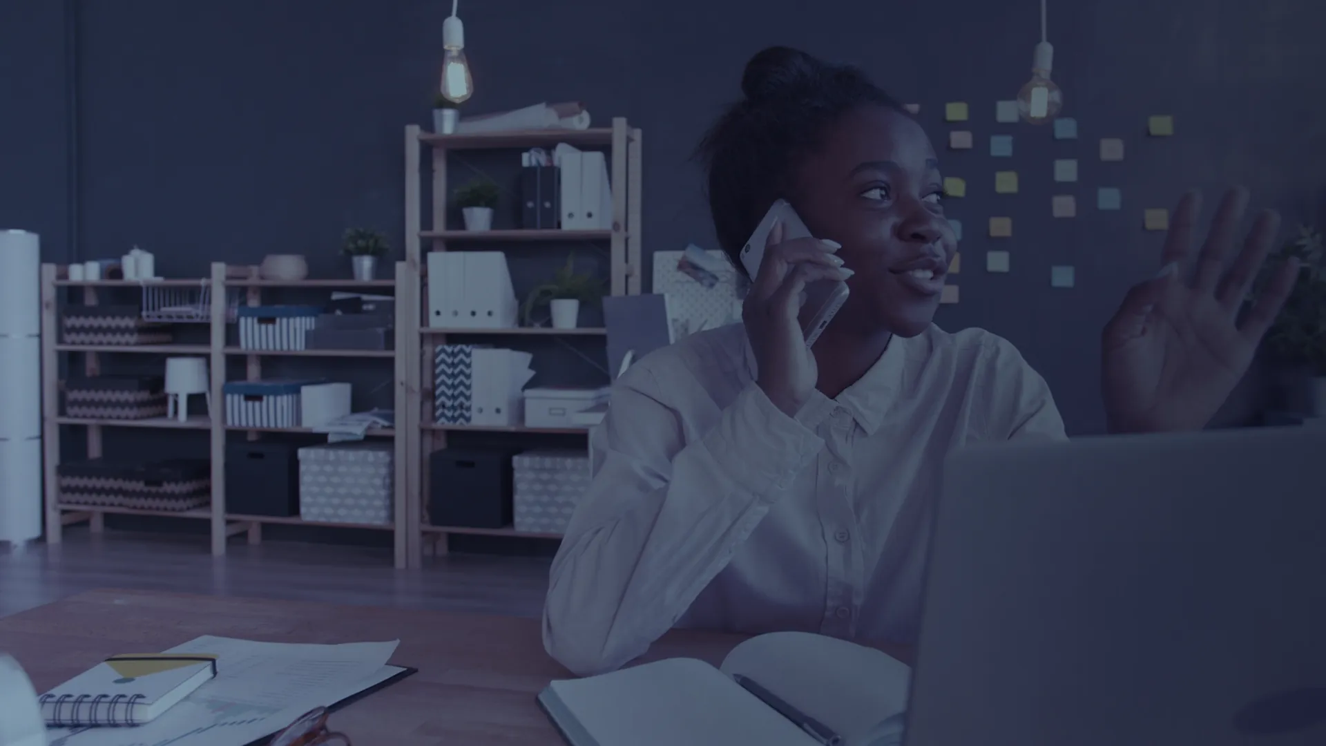 Woman on a call at her desk