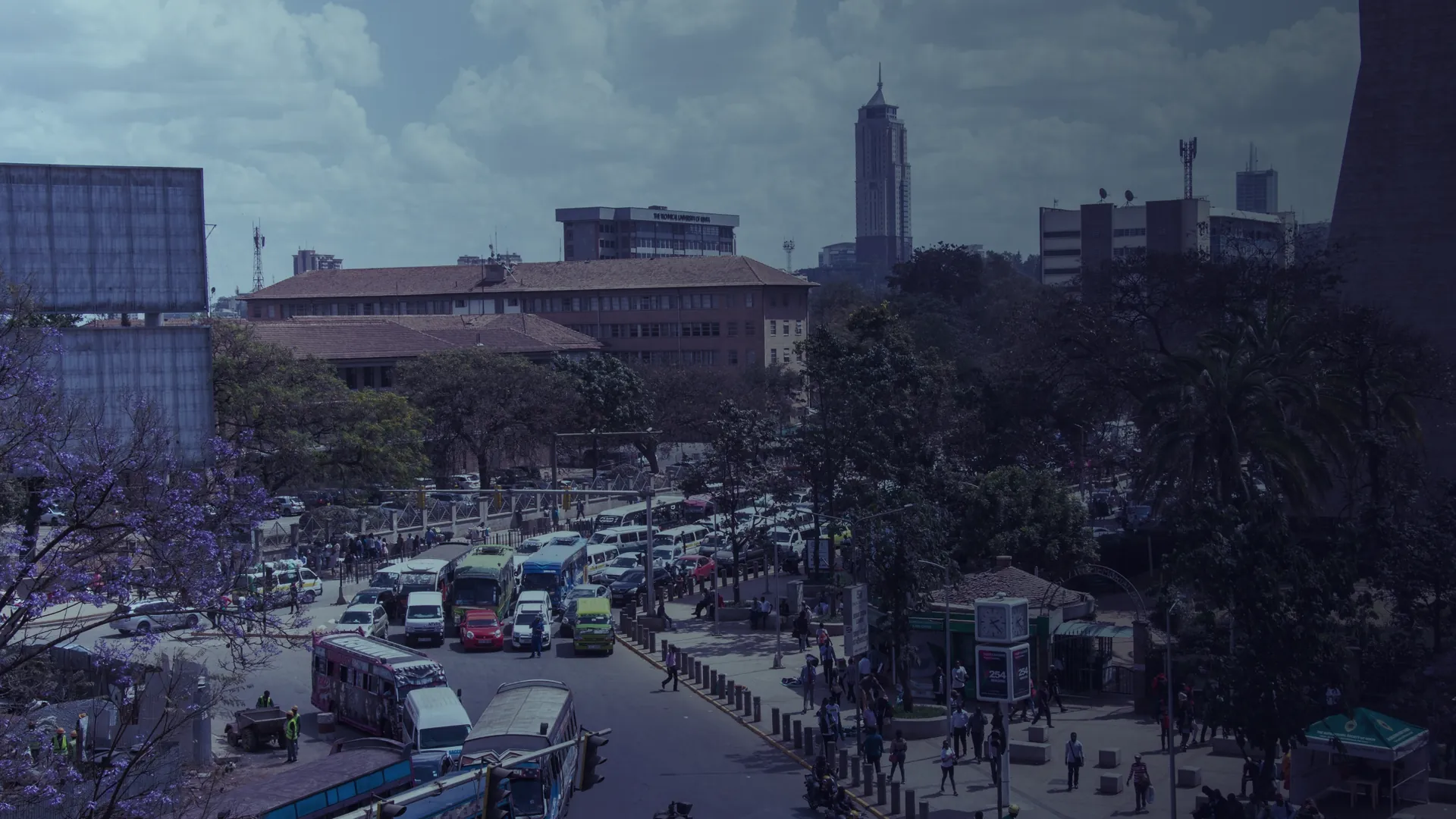 Busy Nairobi street with matatus