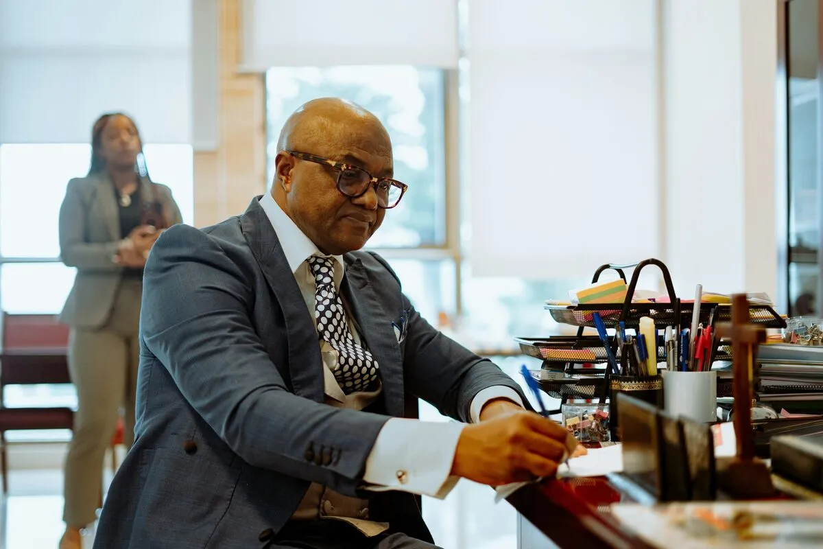 Senior advocate working through files at his desk
