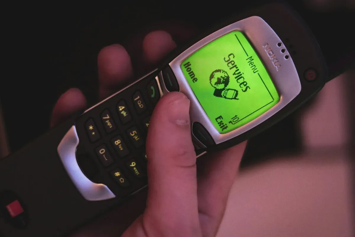 Feature phone open on its SIM services menu